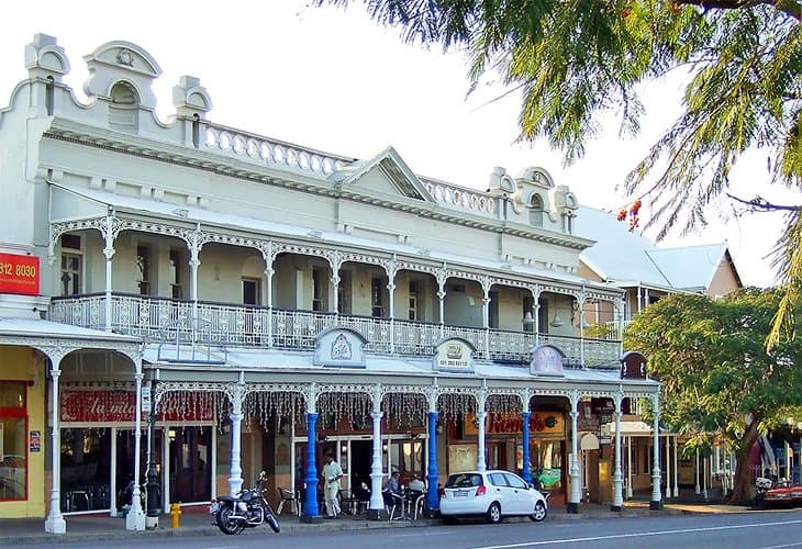 A vibrant city skyline with iconic landmarks and bustling streets, showcasing urban energy and charm